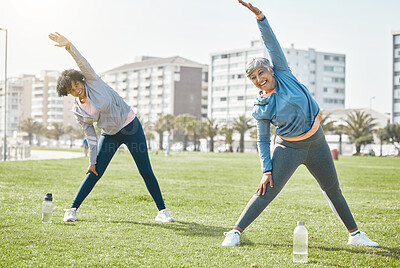 Buy stock photo Women, senior and stretching outdoor, exercise and wellness with flexibility and start workout in park. Female people, friends with pilates or running in nature, training and fitness with vitality