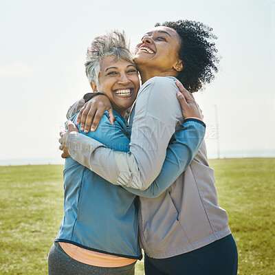 Buy stock photo Hugging, fitness and senior women bonding together in an outdoor park after a workout or exercise. Happy, smile and elderly female friends or athletes with love and care after training in nature.