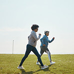 Women speed walking, fitness and cardio outdoor with training and energy with mockup space. Female people, team in park with exercise and race with sports and athlete, health and wellness in nature