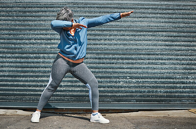 Buy stock photo Woman, fitness and dab dance outdoor at training, exercise or workout achievement with celebration. Mature runner lady, comic dancing and winner in city with mindset, freedom or commitment to health