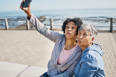 Senior fitness, selfie and women at the beach for workout, wellness and morning cardio in nature. smartphone, profile picture and female friends at sea for profile picture, photo or exercise memory