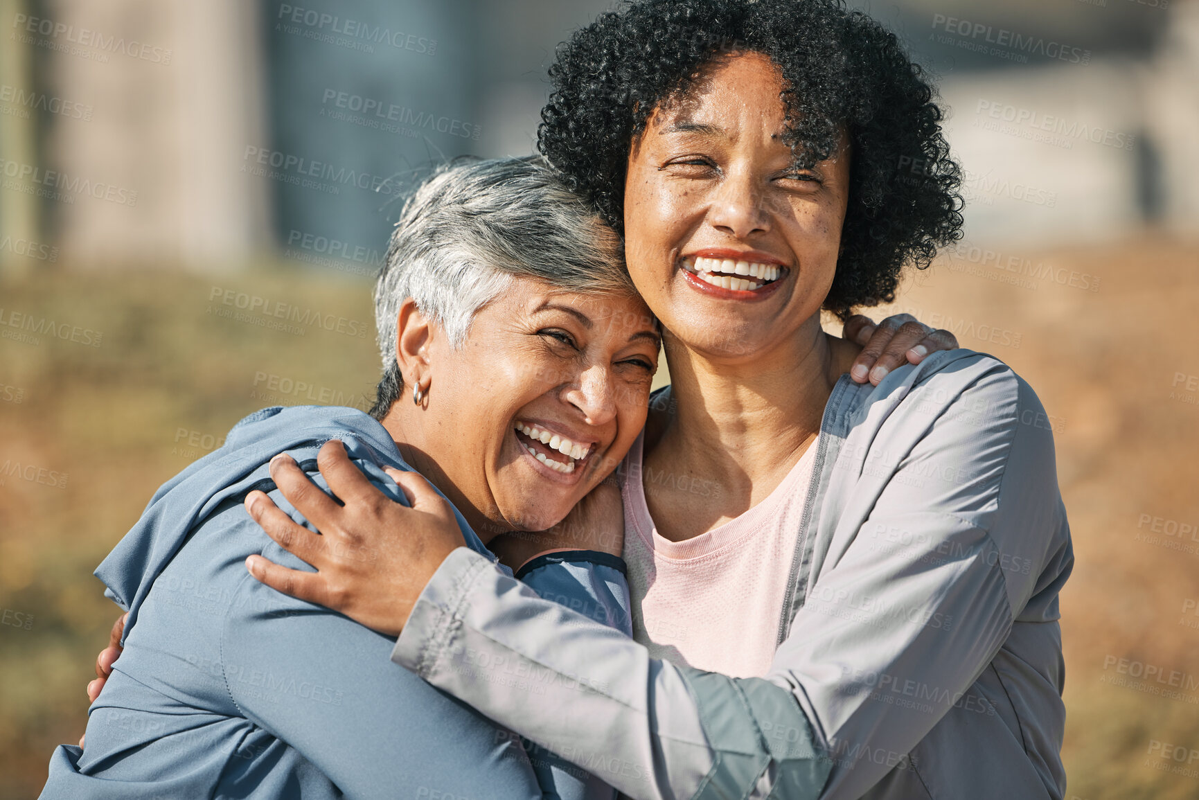 Buy stock photo Senior women, hug and laugh closeup with fitness and exercise outdoor for health. Elderly people, sport training and happy friends with excited bonding and embrace after running of a mature athlete