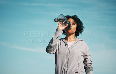 Buy stock photo Woman, drinking water and health with fitness, hydration and workout outdoor. Plastic bottle, liquid and wellness with female athlete in nature, exercise and training with h2o and mockup space