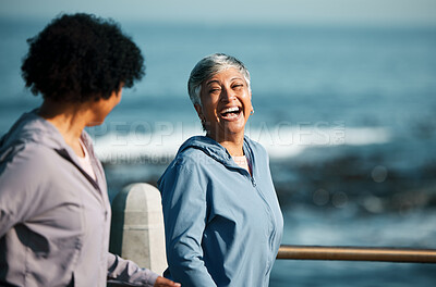 Buy stock photo Fitness, happy and senior women by ocean for healthy body, wellness and cardio wellbeing on promenade. Sports, friends and female people walking on boardwalk for exercise, training and workout