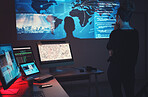 Cybersecurity, woman thinking and global network tech for phishing, ransomware and cyber terrorism search. Maps, digital database and IT team in dark room for virtual malware hacking fix of employee