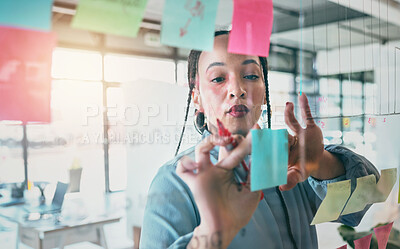 Buy stock photo Woman at glass with ideas, thinking and sticky note for business planning, brainstorming or working process. Moodboard, strategy and writing notes for startup proposal on mind map at office workshop.