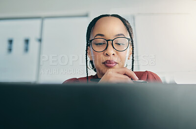 Buy stock photo Thinking, laptop and face of professional woman reading, planning and editing online news report, social media post or research. Editor, project ideas and female reporter working on article story