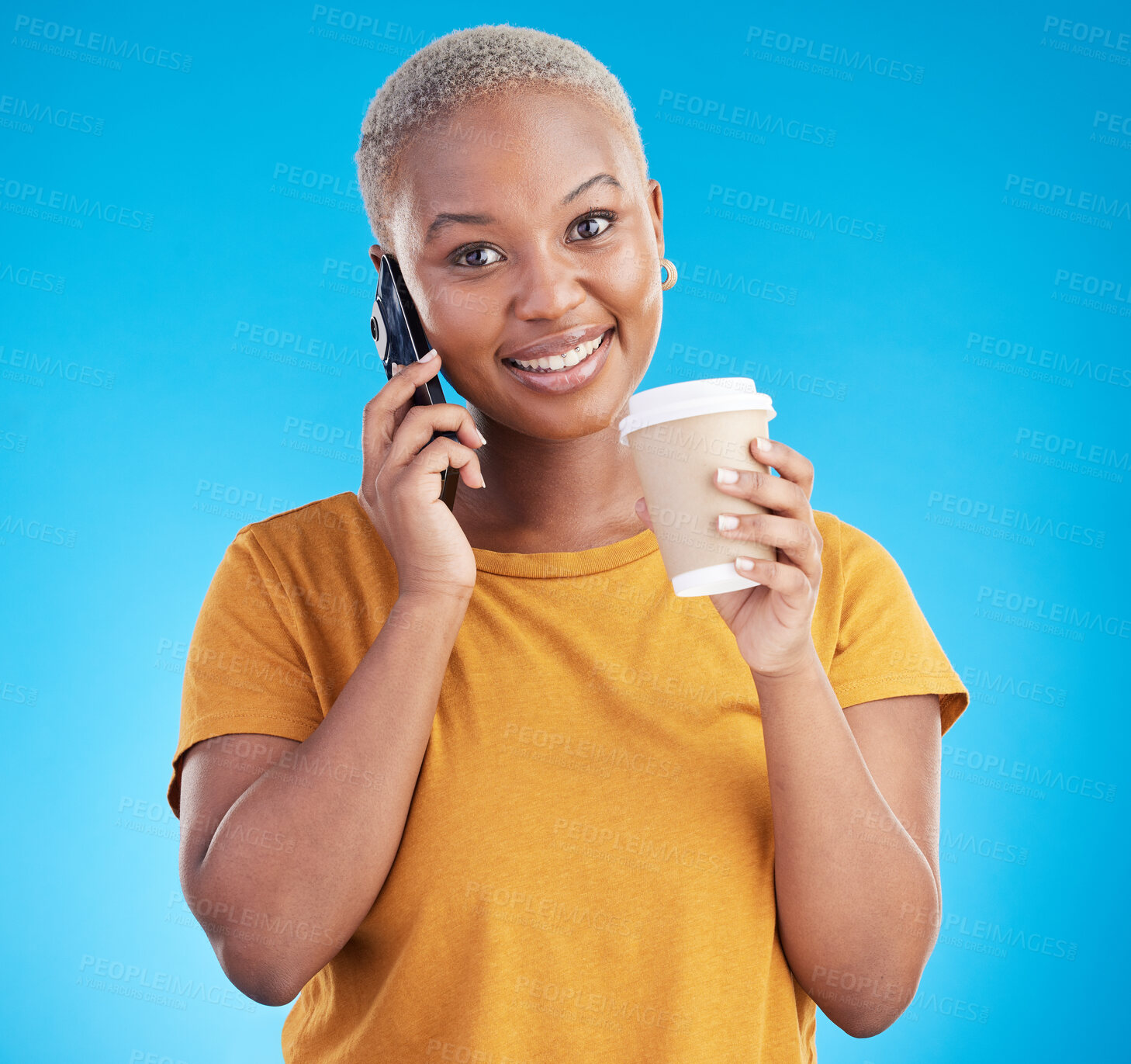 Buy stock photo Coffee, portrait or black woman on a phone call in studio on blue background talking for communication. Tea, face smile or happy girl drinking, listening or calling to chat in conversation on mobile