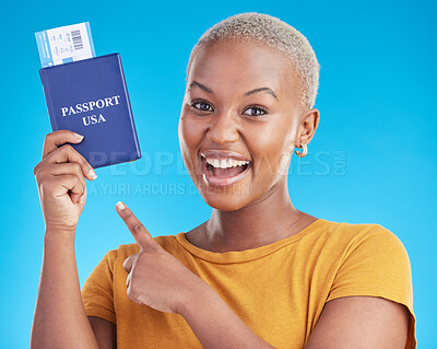 Buy stock photo Black woman, pointing at passport and plane ticket, excited about travel to USA in portrait on blue background. Adventure, boarding pass and documents for journey, female person is happy in studio