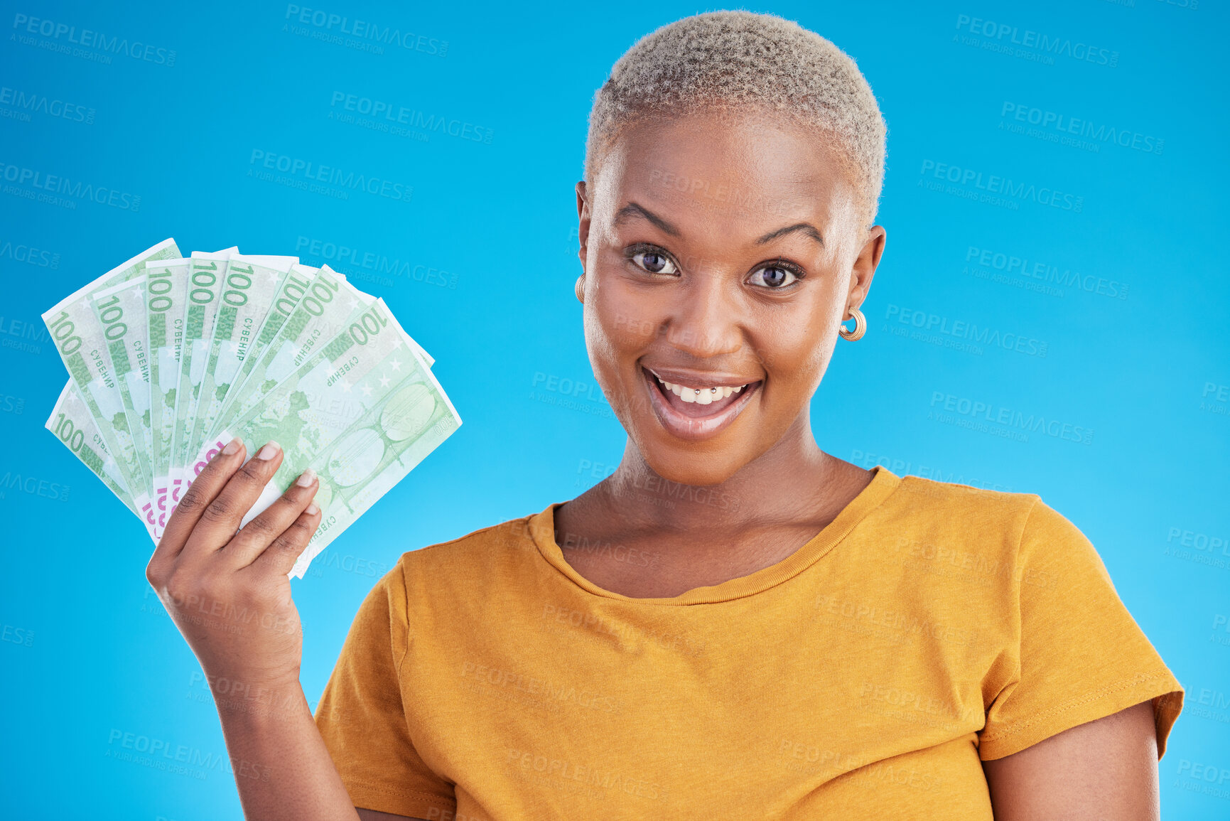Buy stock photo Black woman, money fan and finance, portrait and happy with prize, loan and dollars isolated on blue background. Cash, cashback and lottery win with payment, financial freedom and bills in studio