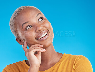 Buy stock photo Thinking, smile and black woman with ideas, opportunity and solution on a blue studio background. Person, girl or model with problem solving, thoughts and decision with happiness, choice and planning