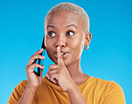 Phone call, secret or finger on lips of black woman in studio for mystery, gossip or conversation. Privacy, news or whisper with girl or shush gesture on blue background for rumor, drama or silence