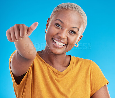 Buy stock photo Black woman, thumbs up and studio portrait with smile for feedback, review and winning by blue background. Gen z African girl, student and happy with icon, sign language and choice with yes for promo