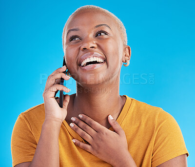 Buy stock photo Phone call, good news or happy black woman in studio on blue background talking for communication. Mobile, face or African girl listening or calling to chat in conversation or speaking of funny joke