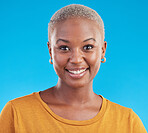 Face, fashion and happy black woman in tshirt isolated on a blue studio background. Portrait, smile and young African person, model or girl from Kenya with style and confidence in casual clothes