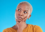 Thinking, decision and black woman with ideas, opportunity and planning on a blue studio background. Person, girl and model with problem solving, solution and question with choice and mockup space