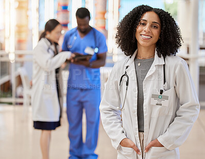 Buy stock photo Woman, portrait and doctor smile for medical services, advice and consulting in busy hospital. Happy surgeon, female therapist and expert healthcare employee with confidence, trust or pride in clinic