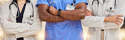 Buy stock photo Doctors, healthcare and team with arms crossed in a hospital for teamwork and collaboration. Diversity, group and professional man and women with stethoscope and name tag for career in medicine