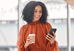 Chat, coffee and a woman with a phone at work for social media, email check or internet information. Smile, break and a young corporate employee on a mobile app and a drink in an office for business