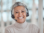 Call center, mature and face of woman with headphones in office for telemarketing, support or contact. Smile, portrait and customer service professional, sales manager or happy consultant from India