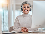 Portrait, computer and happy with a senior woman in a call center for customer service, support or assistance online. Contact, smile and an elderly consultant working at a desk in her crm office