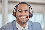Call center, smile and face of man with headphones in office for telemarketing, support and crm. Contact us, portrait and customer service professional, sales agent and happy consultant from Brazil