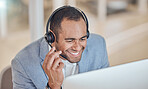 Call center, smile and man at computer for telemarketing, support and crm in office. Contact us, reading and customer service professional, sales agent or consultant at help desk for listening online