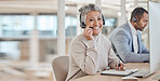 Computer, portrait and a senior woman in a call center for customer service, support or assistance online. Contact, smile and happy female consultant working at a desk in her professional crm office