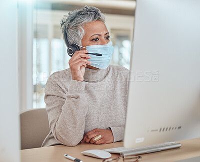 Buy stock photo Call center, face mask and consulting with business woman in office for communication, customer service or advice. Healthcare, virus and bacteria with employee for contact, help desk or hygiene