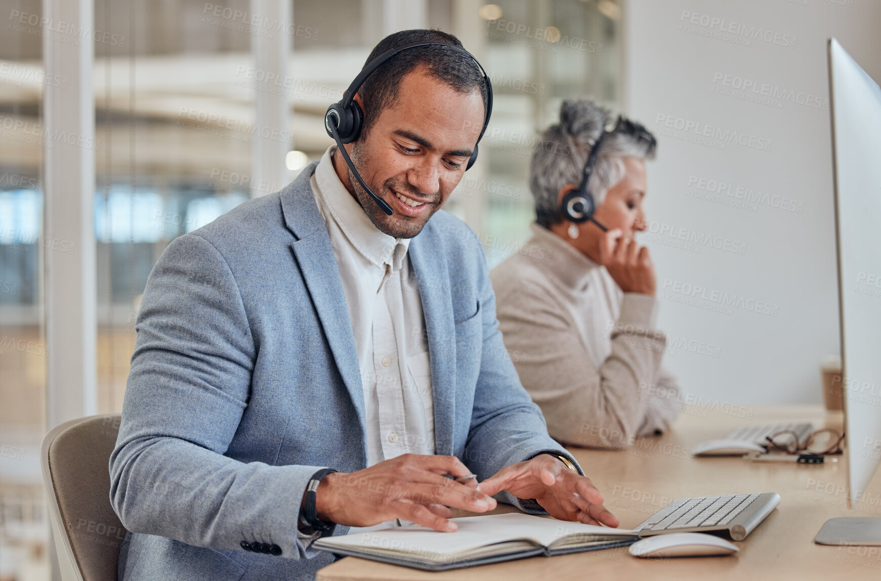 Buy stock photo Writing, call centre and a man consulting for customer service, crm or telemarketing. A happy person or agent with a headset for networking, help desk advice or sales and technical support in office
