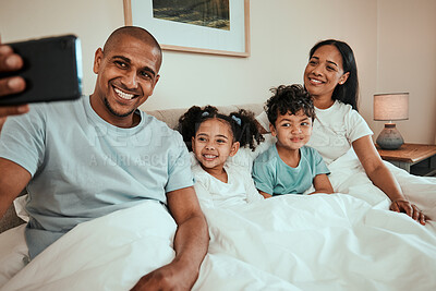 Buy stock photo Family, selfie and phone in bedroom for social media, profile picture or relax with mom and dad in the morning, waking up and bed. Parents, kids and smile on face in memory, together or quality time