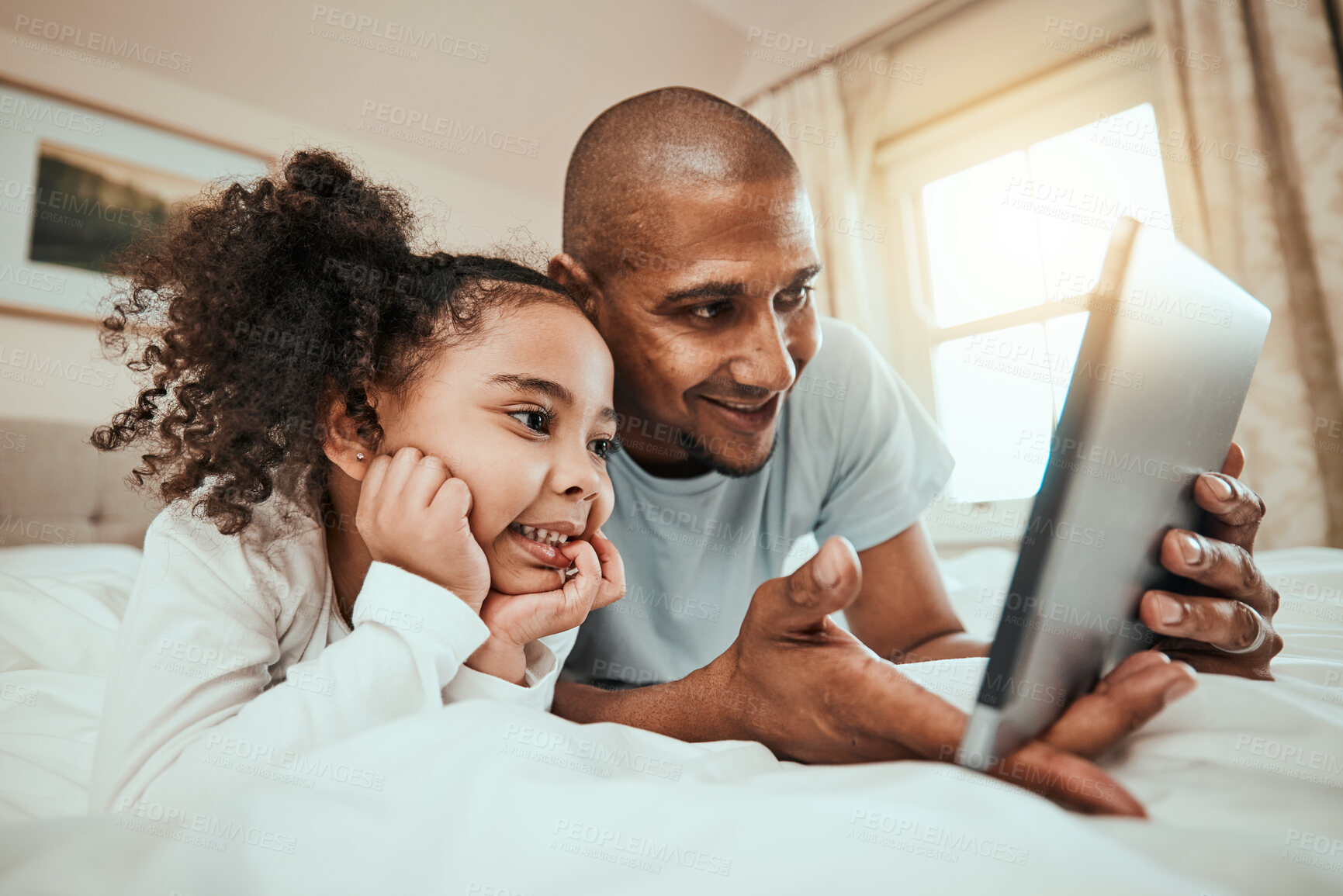 Buy stock photo Father, girl and child with tablet in bedroom for online games, reading ebook story and watch multimedia. Man, dad and happy kid streaming cartoon, movies and digital technology in morning at home 