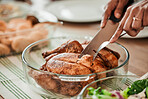 Hands, cutting turkey and thanksgiving in closeup, lunch or food for event, celebration and nutrition. Person, cutlery and chicken food for eating, share and culture for diet, zoom or dinner in home