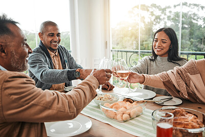 Buy stock photo Wine, food and toast with family at dining table for party, celebration and holiday. Lunch, happy and success with  group of people and cheers with glass at home for event, support or dinner together