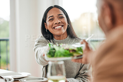 Buy stock photo Happy woman, salad and family dinner at thanksgiving celebration at home. Food, female person and eating at a table with a smile from hosting, lunch and social gathering on holiday in dining room