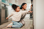 Oven, teaching and parent cooking with child in kitchen for development, care and learning a recipe together at home. Stove, curious and kid help mom or mother prepare food, meal or baking in house
