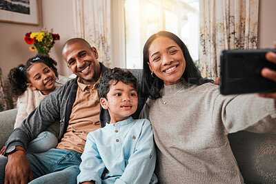 Buy stock photo Family, selfie and children with parents on sofa for social media, online memory and happy together at home. Interracial people, kids with mother and father smile in profile picture or photography