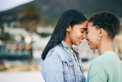 Buy stock photo Women, lesbian and couple, hug and pride with gen z youth and romance, forehead touch outdoor. Female people together, gay relationship and lgbt with date, partner and trust with peace and support