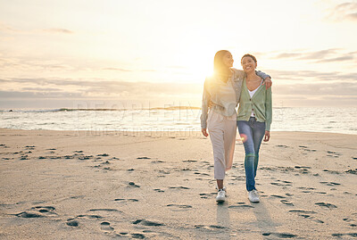Buy stock photo Love, beach and sunset, lesbian couple walking together on sand, sunset holiday adventure or hug on date. Lgbt women, bonding and relax on ocean vacation with romance, pride and happy nature travel.