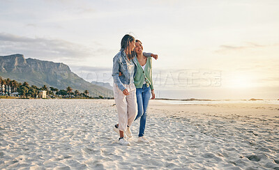 Buy stock photo Love, beach and lesbian couple hug while walking together on sand, sunset holiday adventure or date. Lgbt women, bonding and relax on ocean vacation with romance, pride and happy travel in nature.