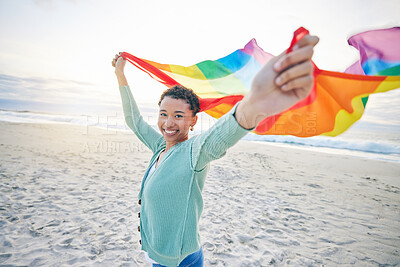 Buy stock photo Woman, beach and rainbow pride flag in portrait with smile, wind and waves for lgbtq, inclusion and equality. African girl, fabric or cloth for human rights, lesbian sexuality and happy on vacation