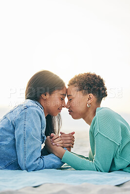 Buy stock photo Women, lesbian and couple with peace and forehead touch, pride with gen z youth and romance outdoor. Female people together, gay relationship and lgbt with date, partner with love and holding hands