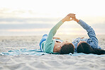 Love, beach and lesbian couple on blanket together, holding hands on sand and sunset holiday adventure. Lgbt women, bonding and relax on ocean vacation with romance, pride and happy lying in nature.
