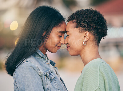 Buy stock photo Lesbian, love and intimate couple outdoor, bonding and romance on date together. Happy, gay women and forehead touch for care, commitment and loyalty, trust and support for lgbtq, queer or homosexual