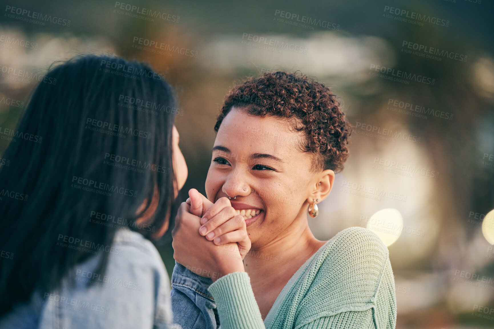 Buy stock photo Holding hands, outdoor and lesbian couple with love, marriage or happiness with romance, relationship or romantic. Lgbtq, female people or bonding with gesture, loving together or smile with equality