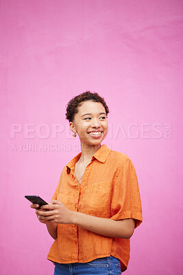 Buy stock photo Smile, online and space with woman and phone for network, social media and communication. Contact, post and technology with person on pink background for gen z, notification and mobile app mockup