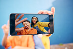 Selfie, screen and women in city on blue background for social media, online post and profile picture. Friendship, smile and female people with hand take photo for bonding, quality time and relax