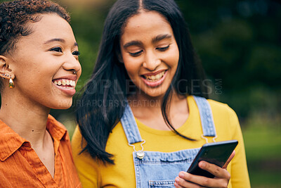 Buy stock photo Phone, happy and women in park for social media, online post and laughing at meme outdoors. Friendship, mobile app and female people smile on smartphone for bonding, holiday and relaxing in nature