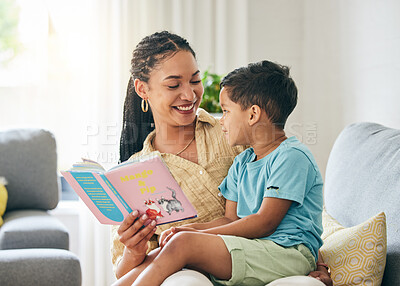 Buy stock photo Book, reading and bonding, mother with kid on sofa for storytelling in living room of happy home, teaching and fun. Love, learning and mom with child, fantasy story on couch and quality time together