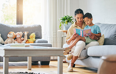 Buy stock photo Learning, book and mother with boy on a sofa for education, growth and child development in their home. Reading, love and mom with kid in living room for storytelling, literacy and communication